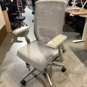 Haworth Very ergonomic office chair with mesh back and adjustable arms for modern office workspace