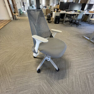 Herman Miller Sayl ergonomic office chair with suspension back and adjustable arms for modern office workspace