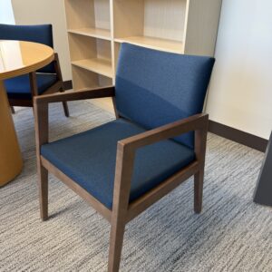 OFS Rein guest chair with upholstered seat and back and four-leg base for office guest seating and meeting spaces